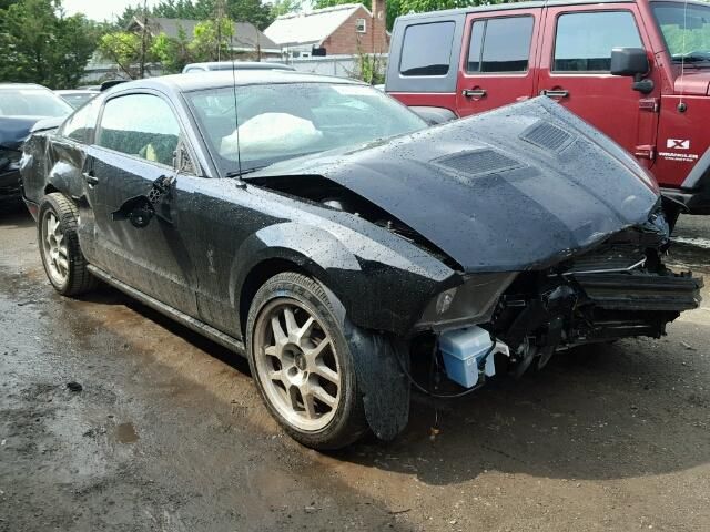 1ZVHT88S995144514-2009-ford-mustang-0