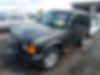 SALTY1549YA264453-2000-land-rover-discovery-1