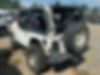 1J4FY19S1XP496418-1999-jeep-wrangler-2