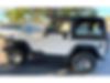 1J4FY29P7XP428092-1999-jeep-wrangler-2