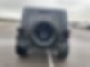 1C4BJWDG9DL654340-2013-jeep-wrangler-unlimited-sport-2