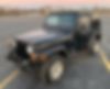 1J4FY29P6XP400199-1999-jeep-wrangler-2