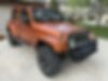 1J4HA6H17BL620758-2011-jeep-wrangler-2