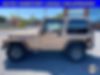 1J4FY19S5XP409202-1999-jeep-wrangler-2