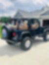 1J4FA29P41P369854-2001-jeep-wrangler-2