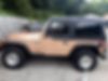1J4FY19S4XP469973-1999-jeep-wrangler-0