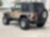 1J4FY19S4XP408736-1999-jeep-sport-2