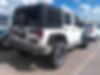 1C4BJWDG4DL656884-2013-jeep-wrangler-unlimited-sport-1