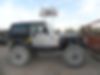 1J4FA49S1YP712002-2000-jeep-wrangler-1