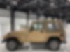 1J4FY49S0XP429973-1999-jeep-wrangler-saharatj-sahara-2