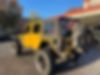 1C4BJWDG4FL585527-2015-jeep-wrangler-unlimited-2