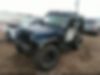 1J4FA49S0YP748179-2000-jeep-wrangler-1