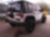 1C4BJWDG4DL656884-2013-jeep-wrangler-unlimited-sport-1