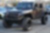 1C4BJWDG8DL654300-2013-jeep-wrangler-unlimited-2