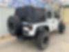 1C4HJWDG6GL219130-2016-jeep-wrangler-unlimited-2