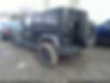1C4BJWDG6DL599202-2013-jeep-wrangler-unlimited-2