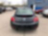 3VWJ17ATXGM601410-2016-volkswagen-beetle-2