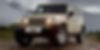 1J4BA5H16BL557085-2011-jeep-wrangler-unlimited-0